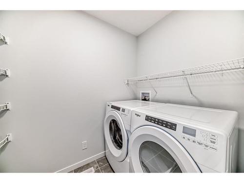 134 Wolf Creek Park Se, Calgary, AB - Indoor Photo Showing Laundry Room