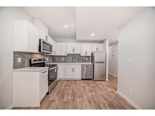 134 Wolf Creek Park Se, Calgary, AB - Indoor Photo Showing Kitchen With Stainless Steel Kitchen With Upgraded Kitchen