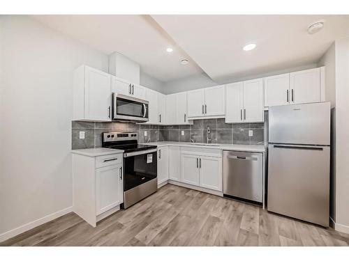 134 Wolf Creek Park Se, Calgary, AB - Indoor Photo Showing Kitchen With Stainless Steel Kitchen With Upgraded Kitchen