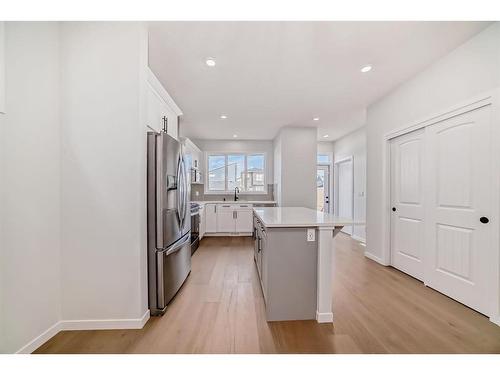 134 Wolf Creek Park Se, Calgary, AB - Indoor Photo Showing Kitchen With Upgraded Kitchen