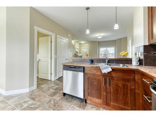 263 Ranch Ridge Meadow, Strathmore, AB - Indoor Photo Showing Kitchen With Double Sink