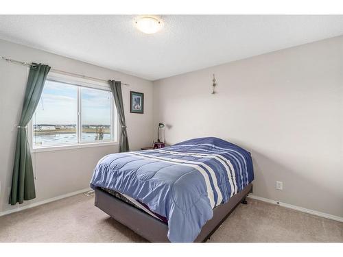 121 Saddlecrest Way Ne, Calgary, AB - Indoor Photo Showing Bedroom