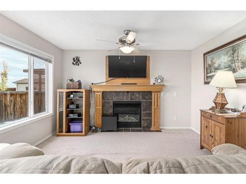 121 Saddlecrest Way Ne, Calgary, AB - Indoor With Fireplace