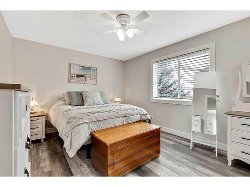 7-117 Bow Ridge Drive, Cochrane, AB - Indoor Photo Showing Bedroom