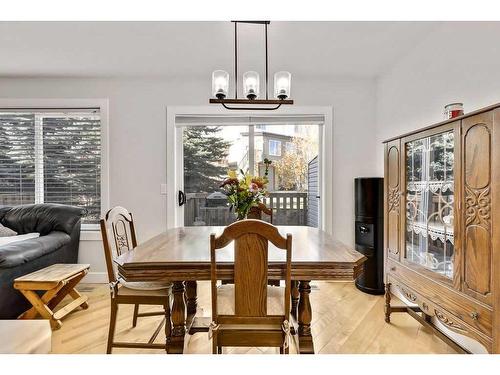 7-117 Bow Ridge Drive, Cochrane, AB - Indoor Photo Showing Dining Room