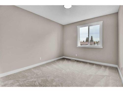 115 Bracewood Way Sw, Calgary, AB - Indoor Photo Showing Other Room