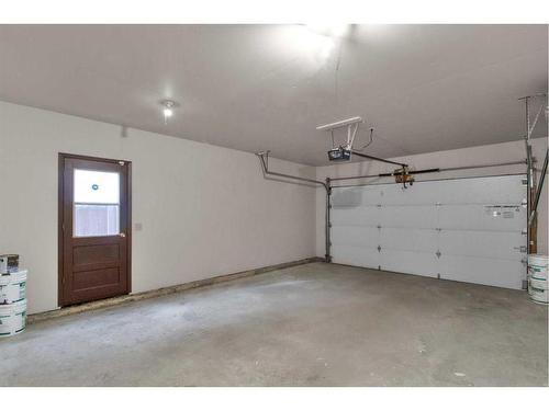 115 Bracewood Way Sw, Calgary, AB - Indoor Photo Showing Garage