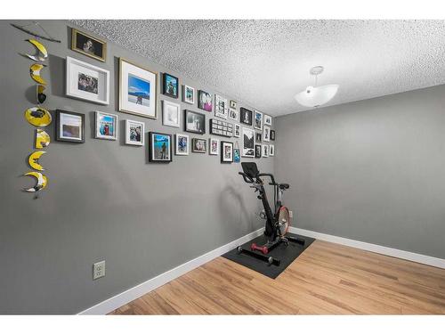 48 Sandpiper Way Nw, Calgary, AB - Indoor Photo Showing Gym Room