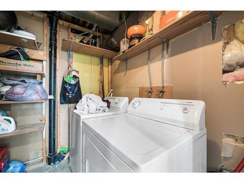 48 Sandpiper Way Nw, Calgary, AB - Indoor Photo Showing Laundry Room