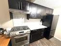 14-4531 7 Avenue Se, Calgary, AB  - Indoor Photo Showing Kitchen 