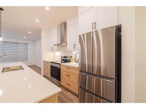 272 Corner Glen Crescent Ne, Calgary, AB - Indoor Photo Showing Kitchen With Stainless Steel Kitchen With Double Sink With Upgraded Kitchen