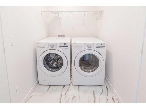 272 Corner Glen Crescent Ne, Calgary, AB - Indoor Photo Showing Laundry Room