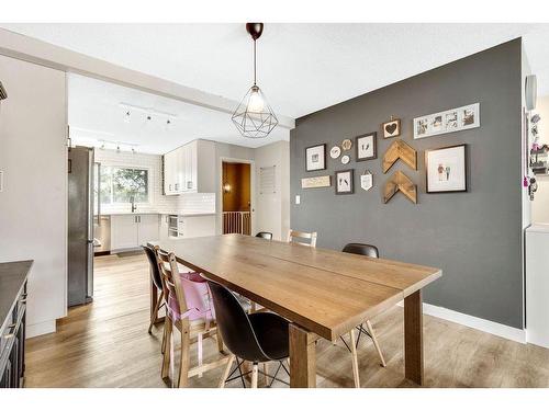 112 Hodson Crescent, Okotoks, AB - Indoor Photo Showing Dining Room