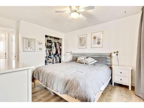 112 Hodson Crescent, Okotoks, AB - Indoor Photo Showing Bedroom