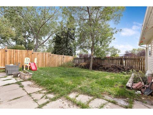 112 Hodson Crescent, Okotoks, AB - Outdoor With Backyard