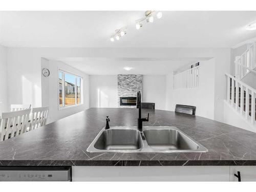 801 Windrow Green Sw, Airdrie, AB - Indoor Photo Showing Kitchen With Double Sink