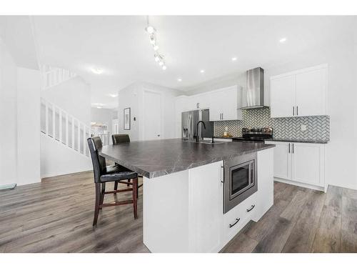 801 Windrow Green Sw, Airdrie, AB - Indoor Photo Showing Kitchen With Upgraded Kitchen