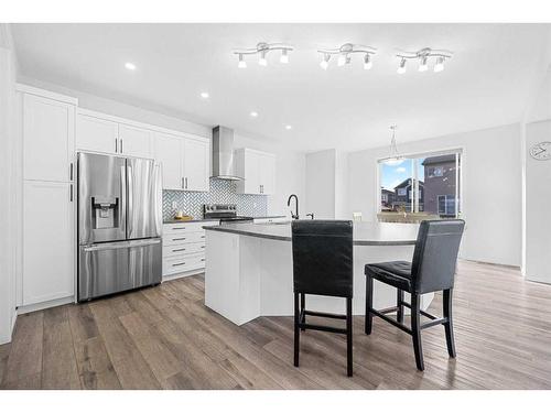 801 Windrow Green Sw, Airdrie, AB - Indoor Photo Showing Kitchen With Stainless Steel Kitchen With Upgraded Kitchen