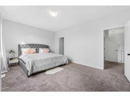 801 Windrow Green Sw, Airdrie, AB - Indoor Photo Showing Bedroom