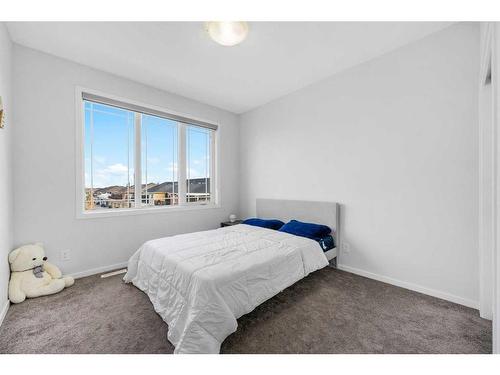 801 Windrow Green Sw, Airdrie, AB - Indoor Photo Showing Bedroom