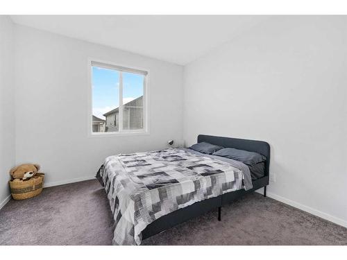 801 Windrow Green Sw, Airdrie, AB - Indoor Photo Showing Bedroom