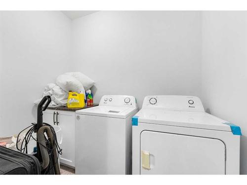 801 Windrow Green Sw, Airdrie, AB - Indoor Photo Showing Laundry Room