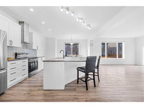 801 Windrow Green Sw, Airdrie, AB - Indoor Photo Showing Kitchen With Stainless Steel Kitchen With Upgraded Kitchen