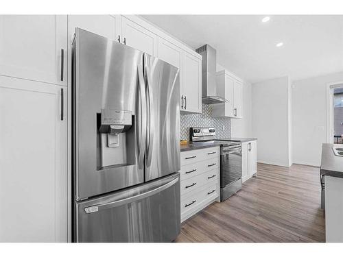 801 Windrow Green Sw, Airdrie, AB - Indoor Photo Showing Kitchen With Stainless Steel Kitchen