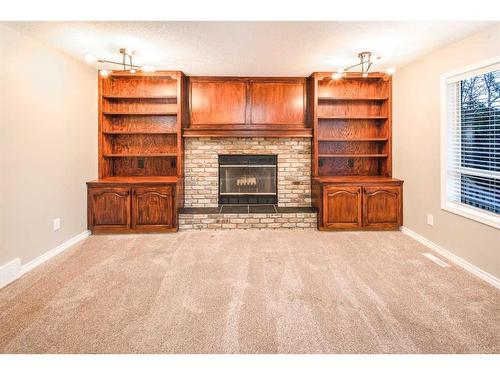 62 Edgebank Circle Nw, Calgary, AB - Indoor With Fireplace