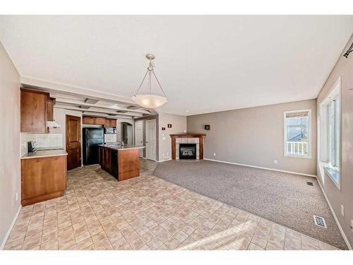 178 Panatella Boulevard Nw, Calgary, AB - Indoor With Fireplace