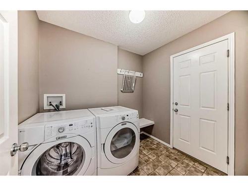 178 Panatella Boulevard Nw, Calgary, AB - Indoor Photo Showing Laundry Room