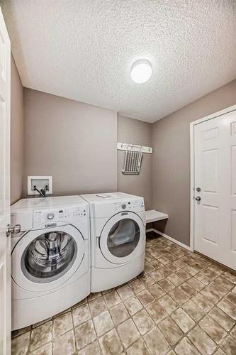 178 Panatella Boulevard Nw, Calgary, AB - Indoor Photo Showing Laundry Room