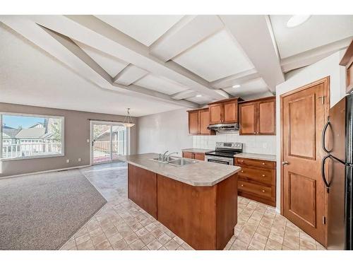 178 Panatella Boulevard Nw, Calgary, AB - Indoor Photo Showing Kitchen With Double Sink