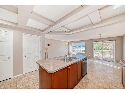 178 Panatella Boulevard Nw, Calgary, AB - Indoor Photo Showing Kitchen With Double Sink