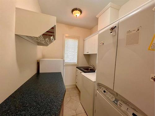 1827 11 Avenue Nw, Calgary, AB - Indoor Photo Showing Laundry Room