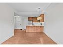 302-808 Spring Creek Drive, Canmore, AB  - Indoor Photo Showing Kitchen 