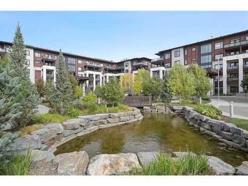 317-12 Mahogany Path Se, Calgary, AB - Outdoor With Body Of Water With Balcony