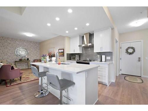 317-12 Mahogany Path Se, Calgary, AB - Indoor Photo Showing Kitchen With Upgraded Kitchen