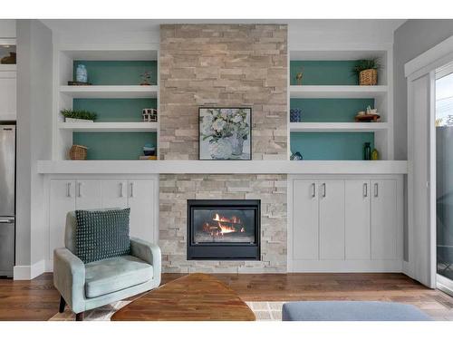 1920 6 Street Nw, Calgary, AB - Indoor Photo Showing Living Room With Fireplace