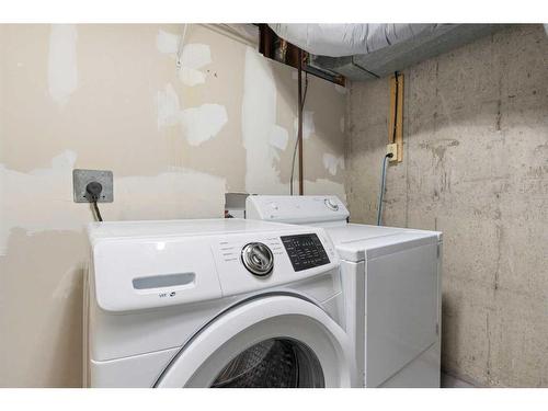 2609 Canmore Road Nw, Calgary, AB - Indoor Photo Showing Laundry Room