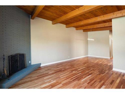 2609 Canmore Road Nw, Calgary, AB - Indoor Photo Showing Other Room With Fireplace