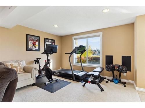 110 Springborough Point Sw, Calgary, AB - Indoor Photo Showing Gym Room