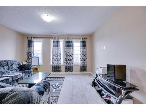 56 Red Embers Sq Ne Square West, Calgary, AB - Indoor Photo Showing Living Room