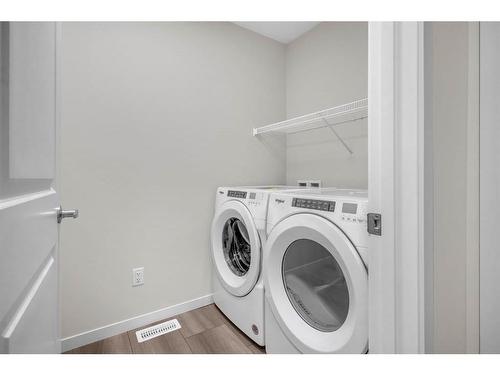 122 Magnolia Drive Se, Calgary, AB - Indoor Photo Showing Laundry Room