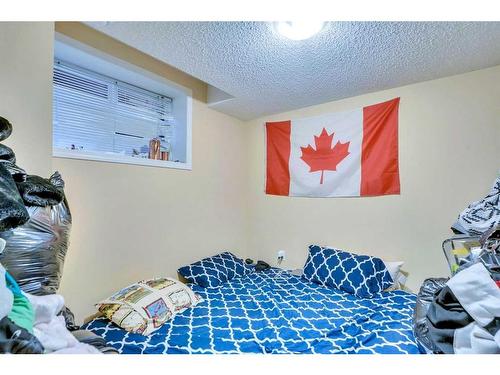 48 Saddlecrest Place Ne, Calgary, AB - Indoor Photo Showing Bedroom