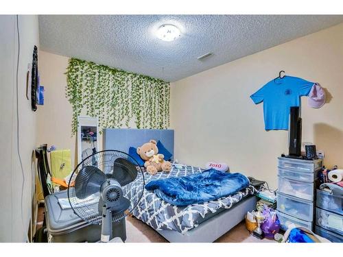 48 Saddlecrest Place Ne, Calgary, AB - Indoor Photo Showing Bedroom