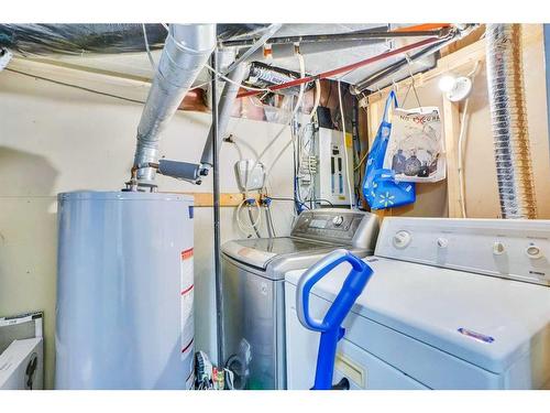 48 Saddlecrest Place Ne, Calgary, AB - Indoor Photo Showing Laundry Room