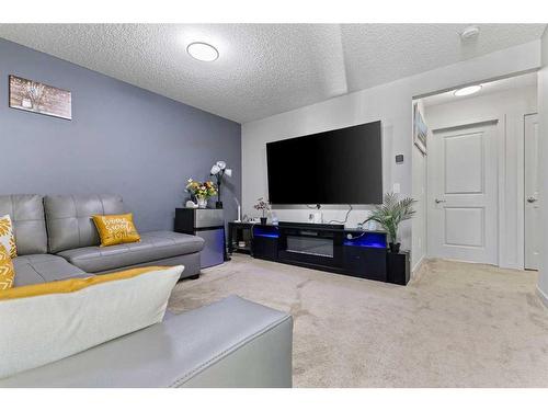 18 Evanscrest Terrace Nw, Calgary, AB - Indoor Photo Showing Living Room