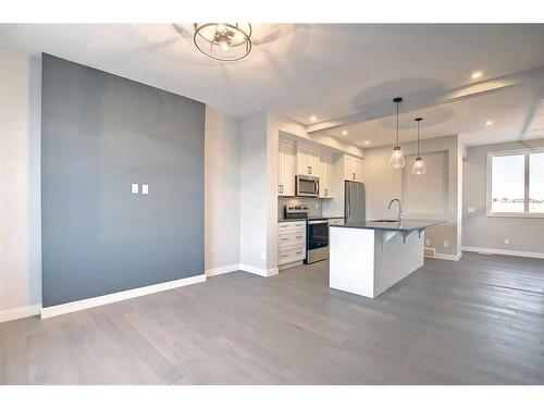 310 Sundown Road, Cochrane, AB - Indoor Photo Showing Kitchen