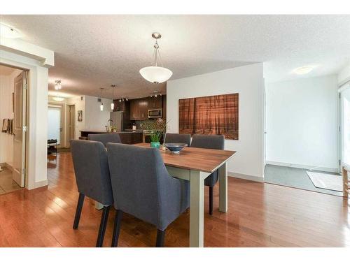 110-1905 27 Avenue Sw, Calgary, AB - Indoor Photo Showing Dining Room